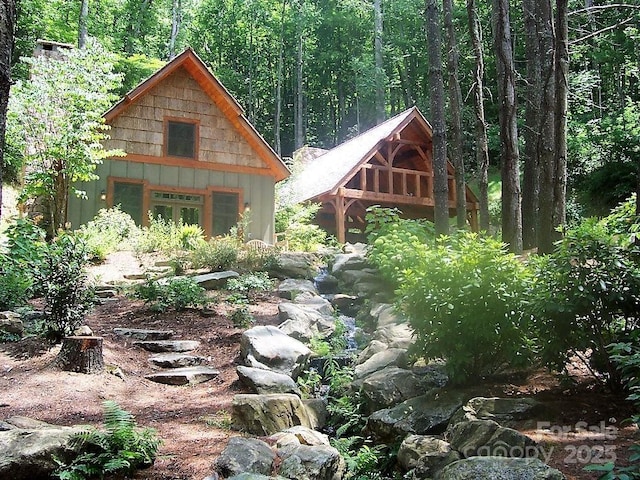 45 Boulder Creek Ln Unit 28, Tuckasegee, NC 28783 - view of outdoor structure featuring a view of trees
