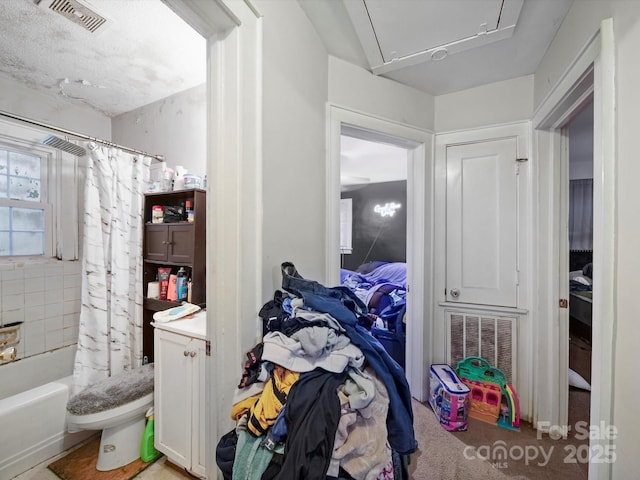 1004 E 8th Ave, Gastonia, NC 28054 - bathroom featuring shower / bath combo with shower curtain