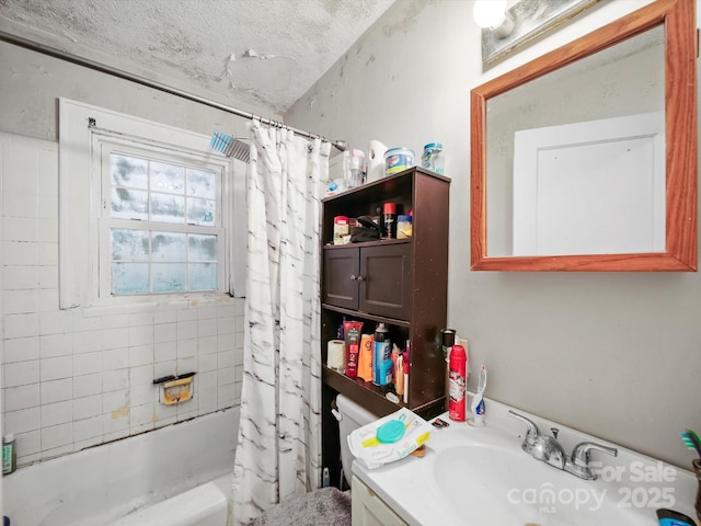 1004 E 8th Ave, Gastonia, NC 28054 - full bath featuring shower / tub combo with curtain, vanity, a textured ceiling, and toilet
