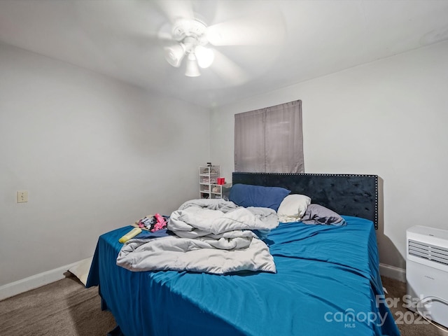 1004 E 8th Ave, Gastonia, NC 28054 - bedroom with baseboards, carpet floors, and a ceiling fan
