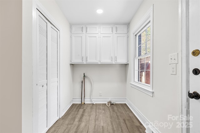 3726 The Plz, Charlotte, NC 28205 - laundry room with cabinet space, baseboards, and recessed lighting