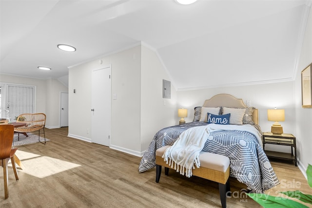 3726 The Plz, Charlotte, NC 28205 - bedroom featuring baseboards, lofted ceiling, wood finished floors, and crown molding