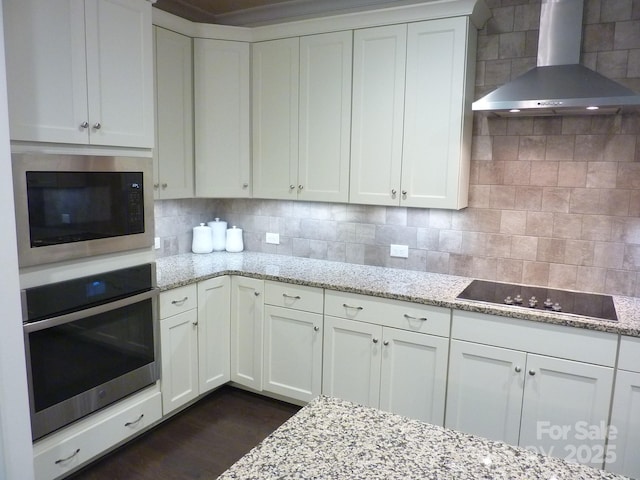 1311 Stonecroft Ln NW, Concord, NC 28027 - kitchen with oven, wall chimney exhaust hood, built in microwave, black electric stovetop, and dark wood-type flooring