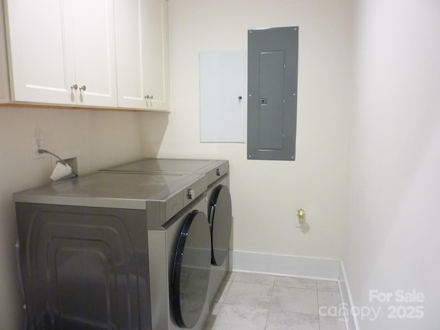1311 Stonecroft Ln NW, Concord, NC 28027 - laundry area featuring electric panel, cabinet space, baseboards, and separate washer and dryer