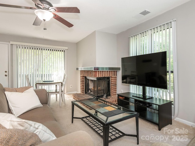 8208 Cedar Glen Dr, Charlotte, NC 28212 - carpeted living room with baseboards, a ceiling fan, and a fireplace