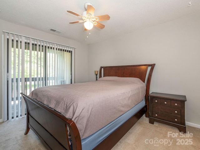8208 Cedar Glen Dr, Charlotte, NC 28212 - carpeted bedroom featuring access to outside, a ceiling fan, and baseboards
