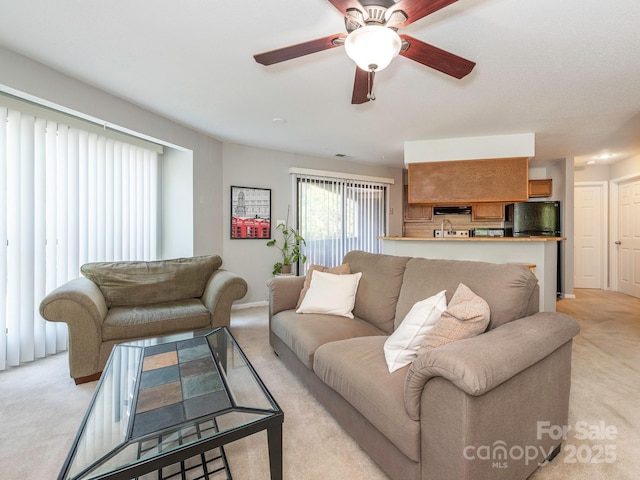 8208 Cedar Glen Dr, Charlotte, NC 28212 - living area featuring light carpet and a ceiling fan