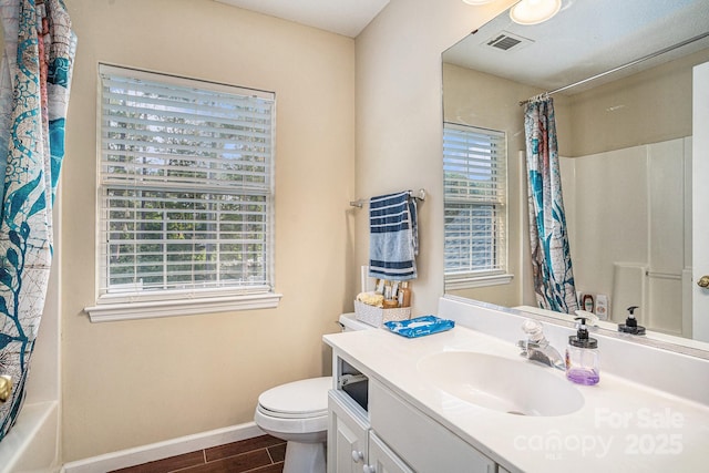 203 Alyssum Ct, Myrtle Beach, SC 29579 - full bathroom with vanity, wood finished floors, toilet, baseboards, and shower / bath combination with curtain