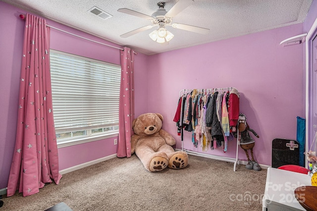 203 Alyssum Ct, Myrtle Beach, SC 29579 - carpeted bedroom featuring a textured ceiling, baseboards, and a ceiling fan