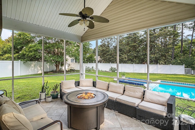 203 Alyssum Ct, Myrtle Beach, SC 29579 - sunroom / solarium with ceiling fan, healthy amount of natural light, lofted ceiling, and an outdoor living space with a fire pit