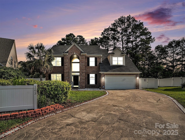 203 Alyssum Ct, Myrtle Beach, SC 29579 - view of front of property featuring a gate, concrete driveway, brick siding, a garage, and roof with shingles