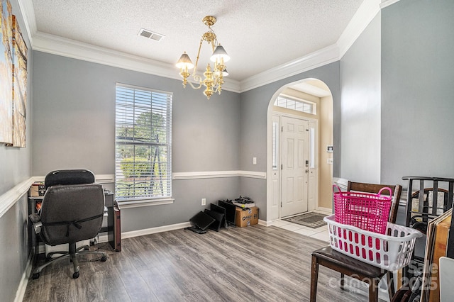 203 Alyssum Ct, Myrtle Beach, SC 29579 - home office featuring healthy amount of natural light, ornamental molding, arched walkways, wood finished floors, and a chandelier