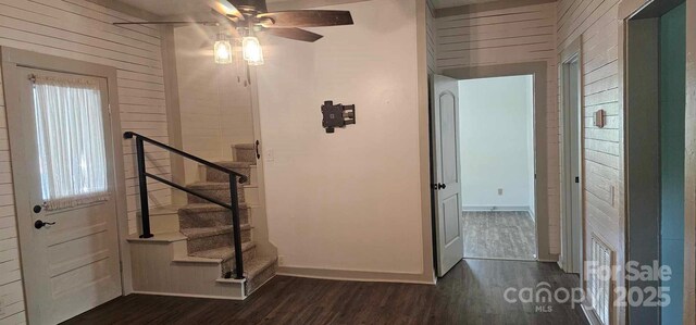 804 N Main St, Oakboro, NC 28129 - hall with dark wood finished floors, stairs, and baseboards