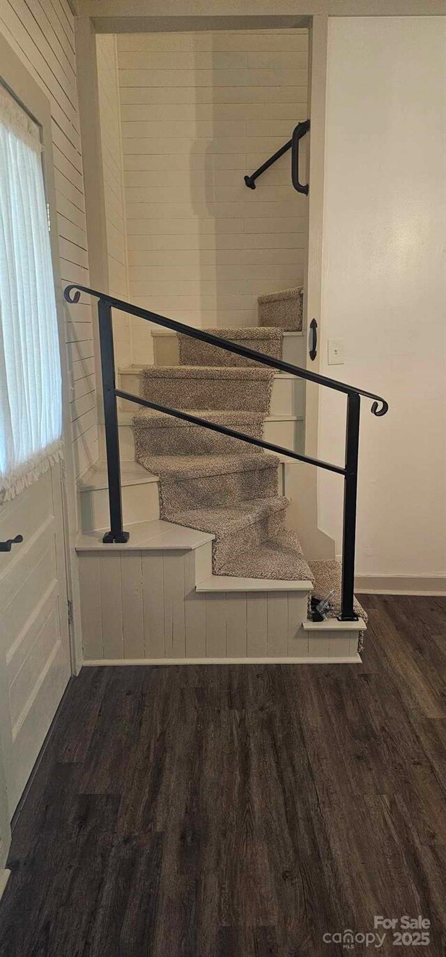 804 N Main St, Oakboro, NC 28129 - staircase featuring wood finished floors and baseboards