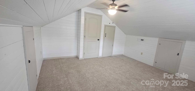 804 N Main St, Oakboro, NC 28129 - additional living space featuring ceiling fan, lofted ceiling, carpet flooring, and wood walls