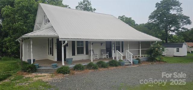 804 N Main St, Oakboro, NC 28129 - farmhouse with a porch and metal roof