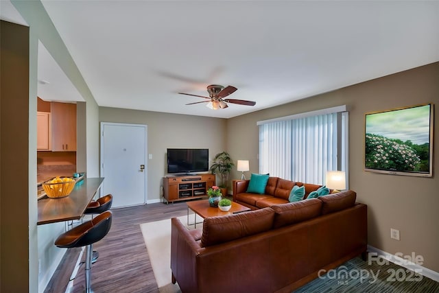 809 High Meadow Ln Unit F, Charlotte, NC 28217 - living room featuring baseboards, dark wood-style flooring, and ceiling fan