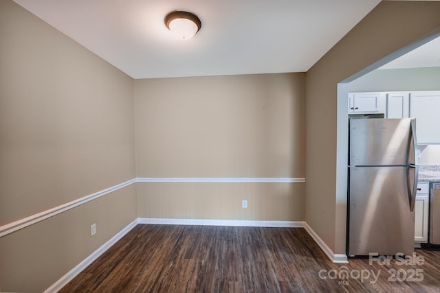 809 High Meadow Ln Unit F, Charlotte, NC 28217 - unfurnished dining area featuring dark wood finished floors and baseboards