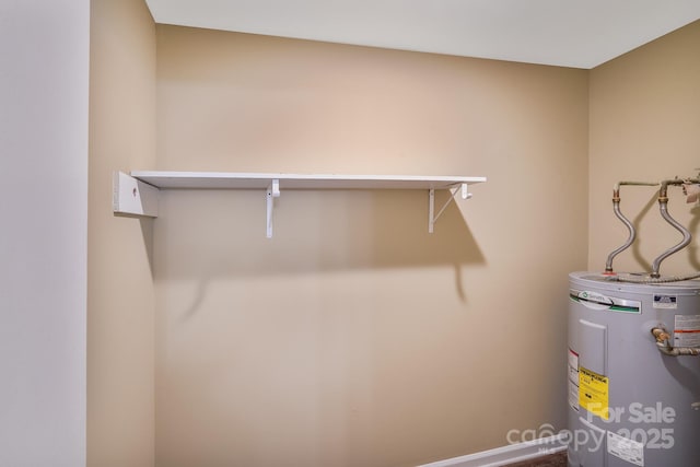 809 High Meadow Ln Unit F, Charlotte, NC 28217 - utility room with water heater
