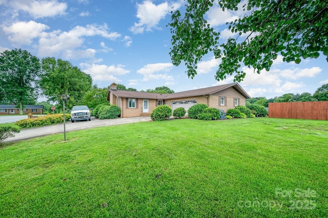 1410 Patterson St, China Grove, NC 28023 - single story home with concrete driveway, brick siding, and a chimney