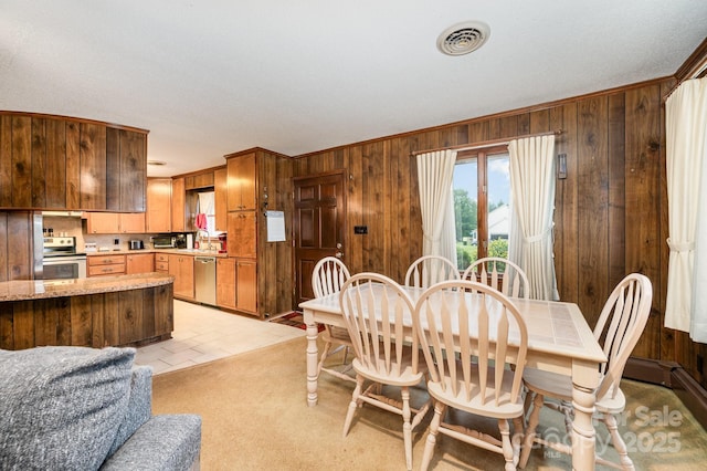 1410 Patterson St, China Grove, NC 28023 - dining space featuring wood walls and crown molding