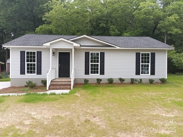 12 Watts St, York, SC 29745 - single story home featuring a shingled roof and a front yard