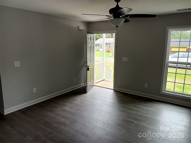12 Watts St, York, SC 29745 - empty room with a ceiling fan, dark wood finished floors, and baseboards