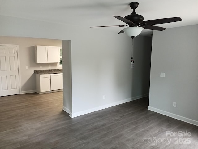 12 Watts St, York, SC 29745 - unfurnished living room with a ceiling fan, baseboards, and dark wood-type flooring