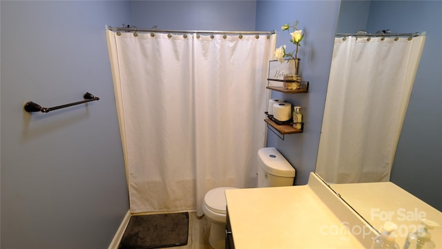 7046 Dorn Cir, Charlotte, NC 28212 - full bathroom with toilet, vanity, and curtained shower