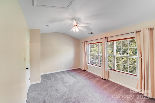 9800 Walkers Glen Dr NW, Concord, NC 28027 - spare room featuring a ceiling fan, carpet flooring, baseboards, and lofted ceiling