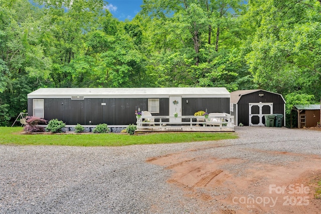 2289 Mccloud St, Denver, NC 28037 - view of front facade with a wooden deck
