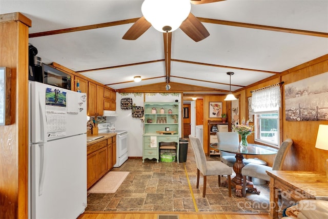 2289 Mccloud St, Denver, NC 28037 - kitchen featuring white appliances, stone finish floors, brown cabinets, and ceiling fan