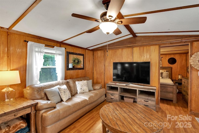 2289 Mccloud St, Denver, NC 28037 - living area with wooden walls, ceiling fan, and light wood-type flooring