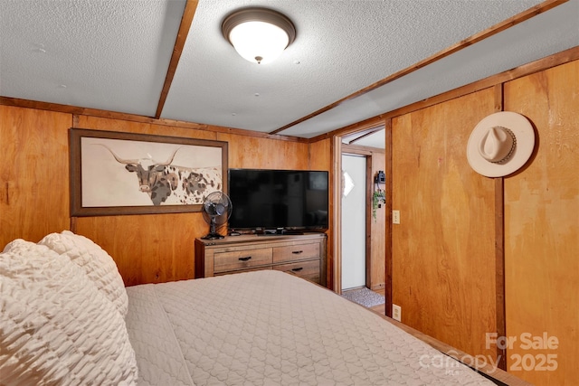 2289 Mccloud St, Denver, NC 28037 - bedroom featuring wood walls and a textured ceiling
