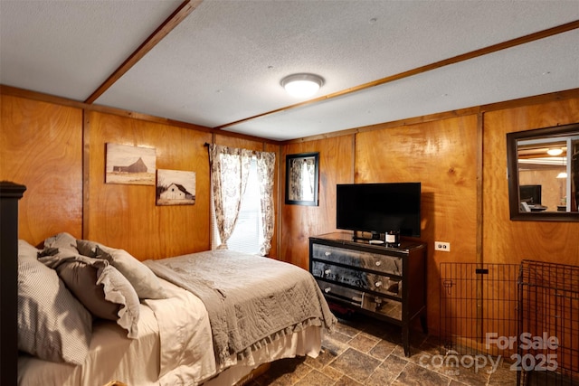 2289 Mccloud St, Denver, NC 28037 - bedroom featuring wood walls, dark stone finish floors, and a textured ceiling