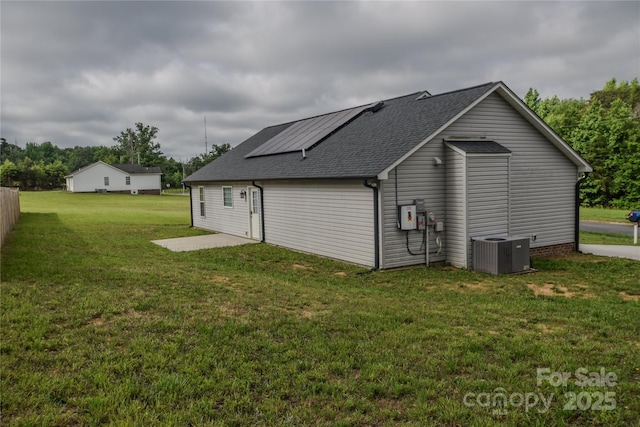 108 Devynne Ct, Salisbury, NC 28146 - rear view of property with central air condition unit, a yard, a shingled roof, and a patio