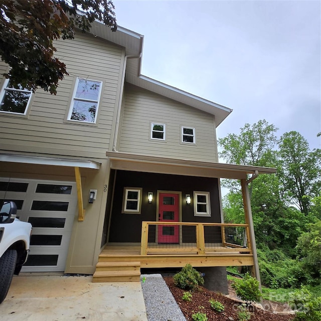 30 Sand Hill Rd, Asheville, NC 28806 - view of front of property featuring covered porch and a garage
