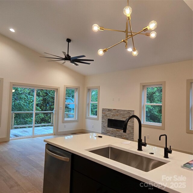 30 Sand Hill Rd, Asheville, NC 28806 - kitchen featuring dishwasher, a sink, open floor plan, vaulted ceiling, and light countertops
