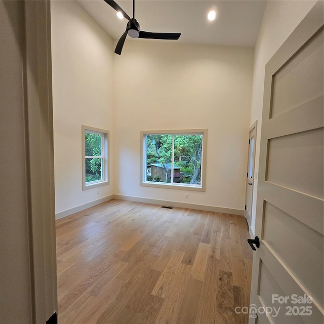 30 Sand Hill Rd, Asheville, NC 28806 - unfurnished room featuring a high ceiling, ceiling fan, baseboards, light wood finished floors, and recessed lighting