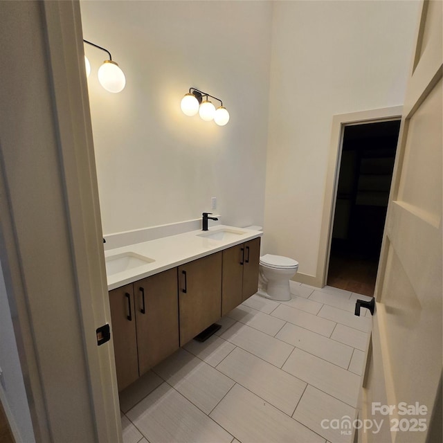 30 Sand Hill Rd, Asheville, NC 28806 - bathroom featuring double vanity, toilet, and tile patterned flooring