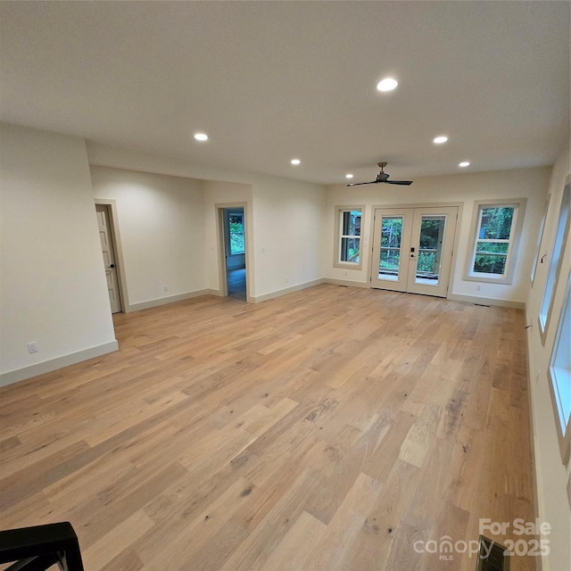 30 Sand Hill Rd, Asheville, NC 28806 - unfurnished living room with recessed lighting, french doors, ceiling fan, light wood finished floors, and baseboards