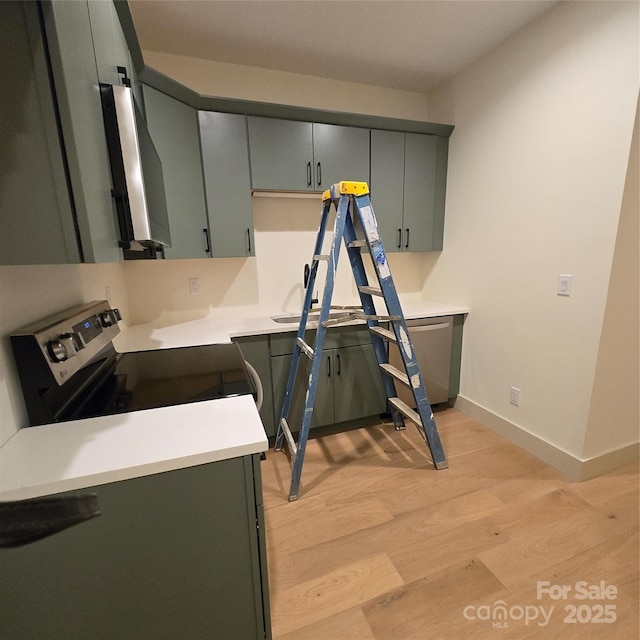 30 Sand Hill Rd, Asheville, NC 28806 - kitchen with stainless steel range with electric stovetop, light wood-type flooring, baseboards, light countertops, and gray cabinetry