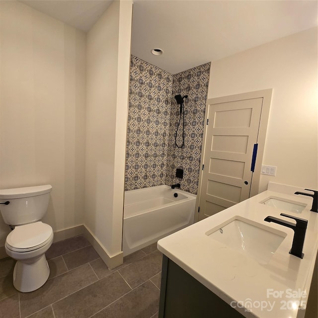 30 Sand Hill Rd, Asheville, NC 28806 - bathroom featuring bathing tub / shower combination, double vanity, tile patterned floors, toilet, and baseboards