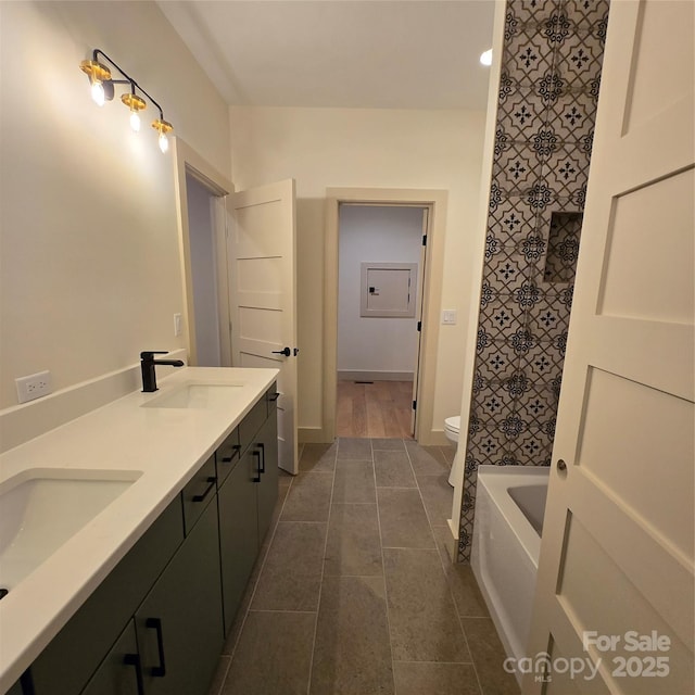 30 Sand Hill Rd, Asheville, NC 28806 - full bathroom with a tub, toilet, double vanity, and tile patterned floors