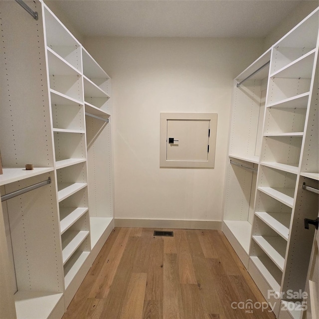 30 Sand Hill Rd, Asheville, NC 28806 - walk in closet featuring light wood-style flooring and electric panel