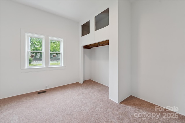 506 N Styers St, Cherryville, NC 28021 - unfurnished bedroom featuring light colored carpet and a closet