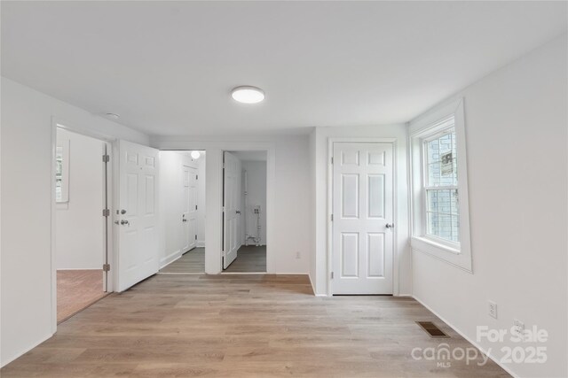 506 N Styers St, Cherryville, NC 28021 - corridor with light wood-style floors and baseboards