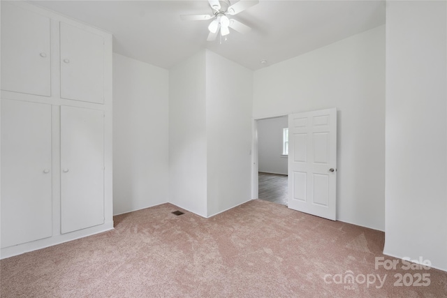 506 N Styers St, Cherryville, NC 28021 - unfurnished bedroom featuring carpet floors and a ceiling fan