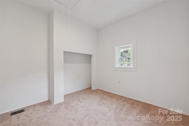 506 N Styers St, Cherryville, NC 28021 - unfurnished bedroom with carpet, attic access, and a closet