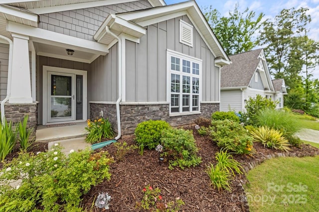 219 Broadleaf Dr, Denver, NC 28037 - view of side of home featuring board and batten siding and stone siding